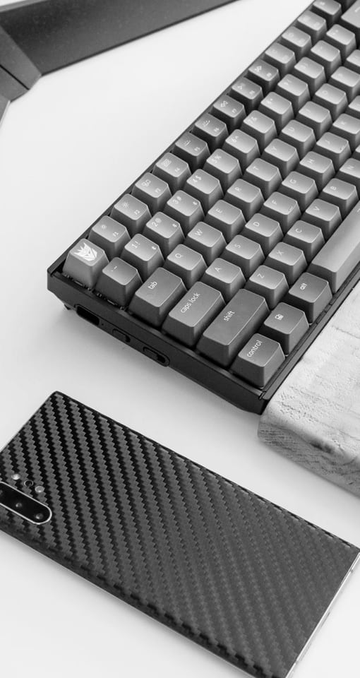 phone and keyboard on a desk